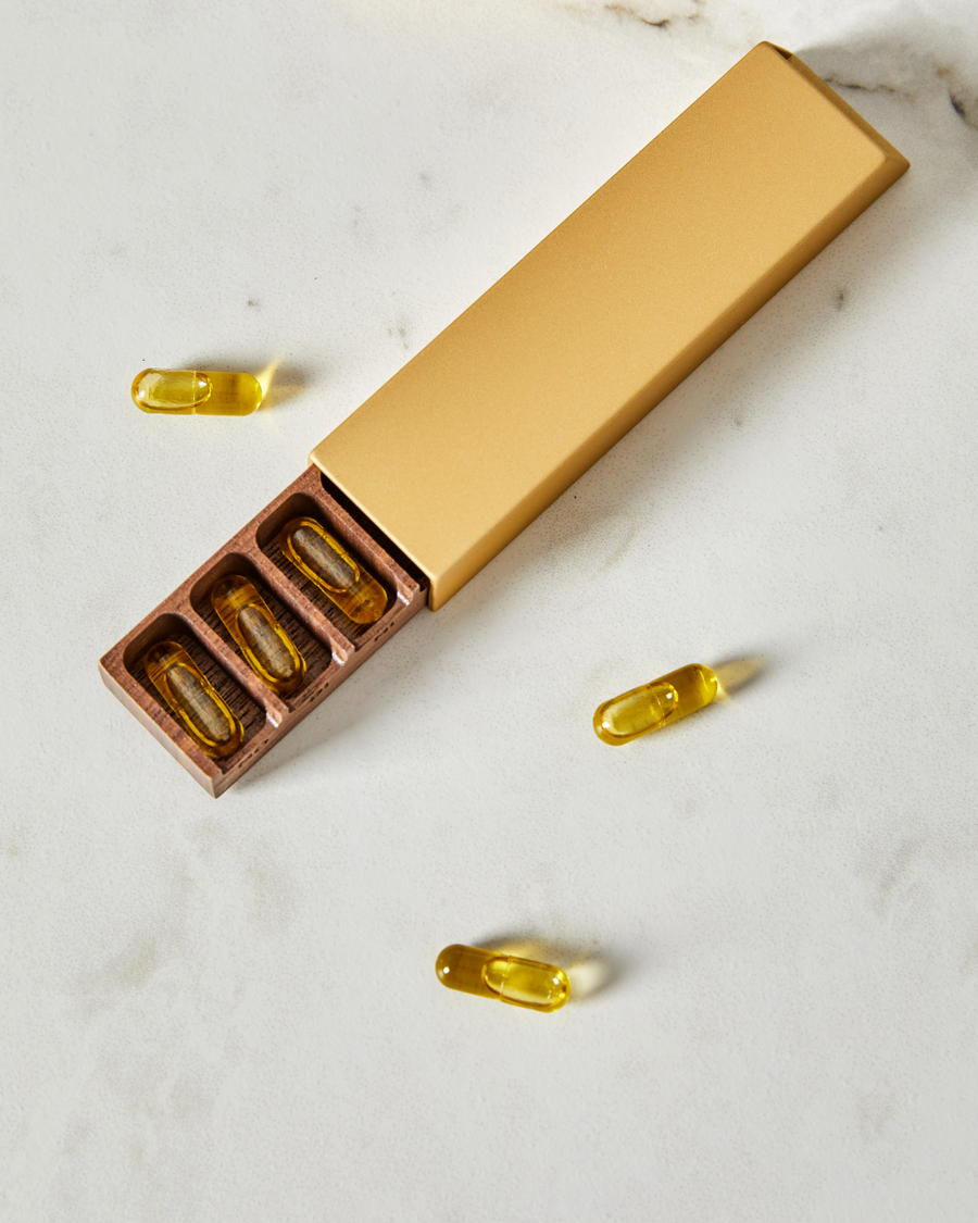 Pill box MONOLITH , gold nut